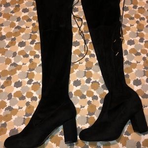 Thigh high boot heel